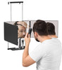 A man shaving his hair with Umitec Hook-on Trifold Mirror, the mirror has LED light and shelf